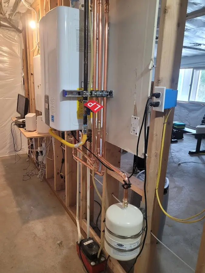 Licensed plumber repairing a kitchen sink in Channelview